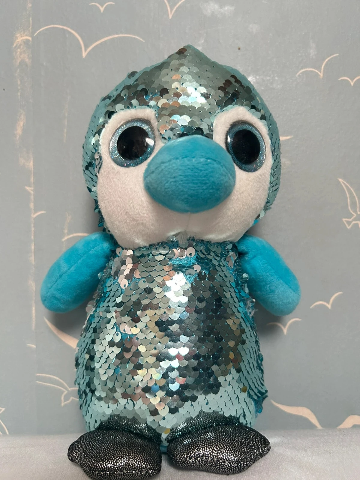 Peluche pingouin bleu à paillettes 24cm